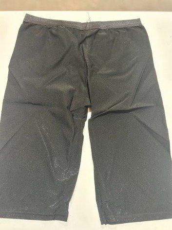 Detalle de cintura alta del pantalón moldeador hombre