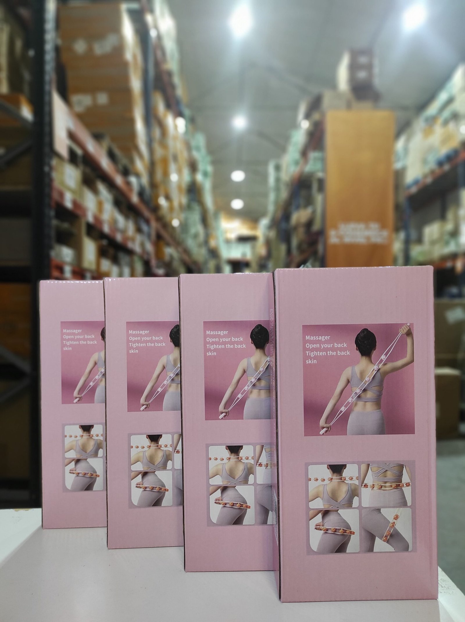 Rodillo manual de masaje corporal con 6 bolas giratorias – blanco y rosa - Imagen 6