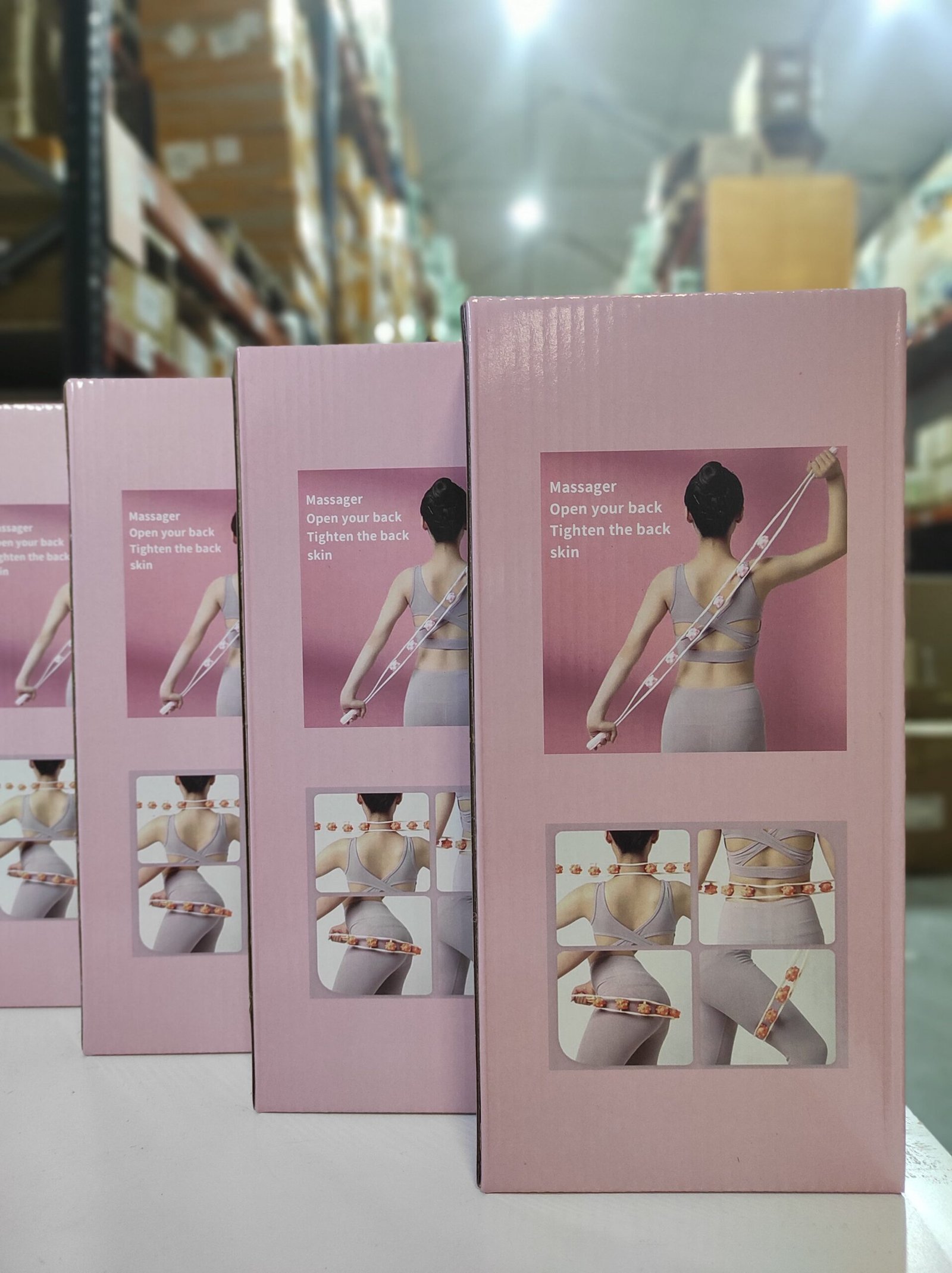 Rodillo manual de masaje corporal con 6 bolas giratorias – blanco y rosa - Imagen 7