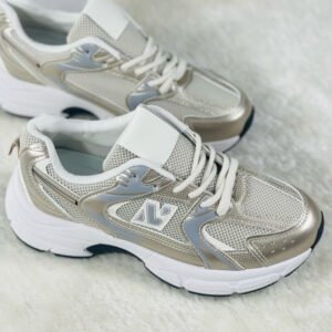 Zapatillas deportivas de mujer R205 doradas