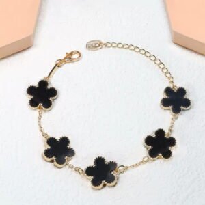 Pulsera de trébol de cinco hojas negro y dorado en acero inoxidable